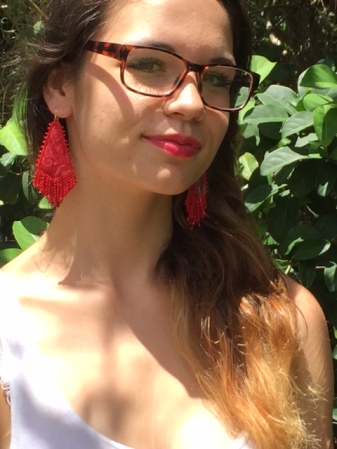 Belle in red earrings